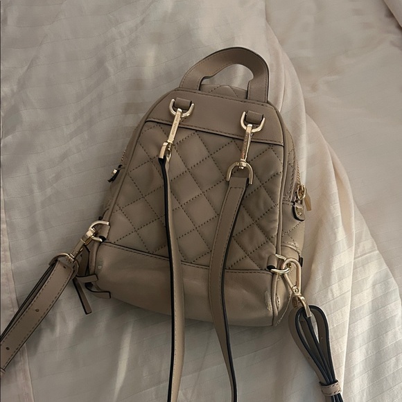 beige leather mini backpack resistant (wipe clean) and 100% vegan leather Michael Kors Quilted Beige Mini